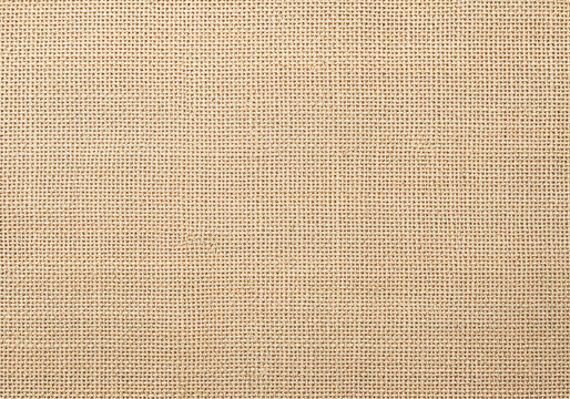Natural burlap fabric texture with a woven pattern and earthy beige tones