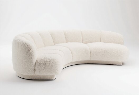 Elegant curved off-white boucle sofa with hidden plinth base on white background