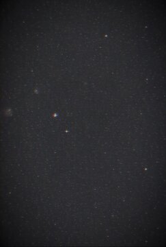 Dark Blurred Background with Faint Textures.