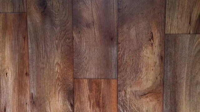 Wooden floor made of planks with pronounced natural texture and warm tone