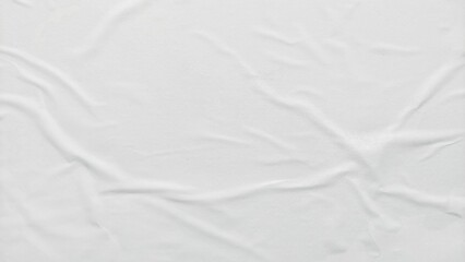 Obraz premium White crumpled and creased paper poster texture background. Abstract white paper background. Crumpled paper poster with soft creased surface texture.