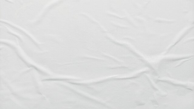 White crumpled and creased paper poster texture background. Abstract white paper background. Crumpled paper poster with soft creased surface texture.