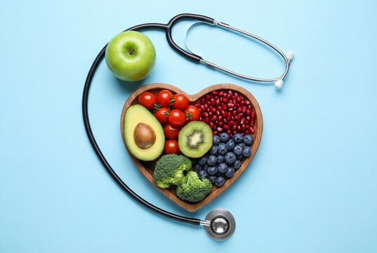 Healthy heart with fresh fruits and vegetables on blue background - Powered by Adobe
