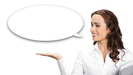 Young happy smiling woman wear shirt, showing pointing. Business concept. Isolated white background. Brunette businesswoman holding grey gray foder. Empty mockup speech bubble