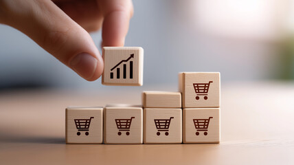 hand putting cube with icon growing graph and shopping cart symbol. 