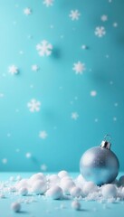 Light blue backdrop, single shiny bauble, scattered snowflakes Overhead shot , christmas, snowflakes, holiday scene