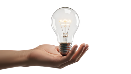Hand cradling a glowing light bulb on black background with creative inspiration