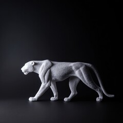 Obraz premium Sculpted panther statue on black background