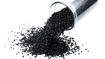 Spilled activated carbon granules on transparent background
