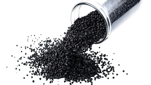 Spilled activated carbon granules on transparent background