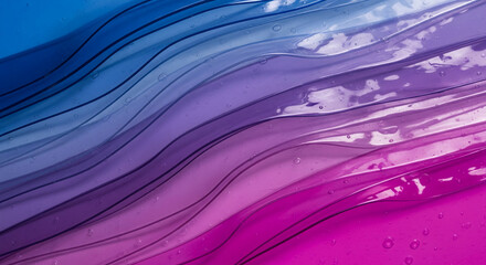 Close-up of translucent wavy material with color gradient from blue to violet, creating abstract pattern with liquid effect, for modern concepts