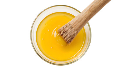 National pie day preparation egg wash in glass bowl with pastry brush and glossy yolk surface for baking