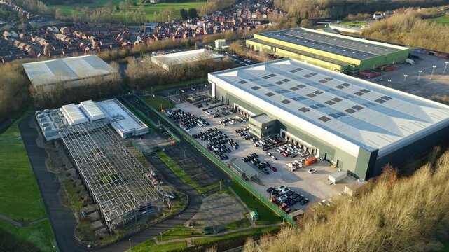 Birmingham, United Kingdom - 31 December 2025: Aerial view of the ATOS Longbridge data centre exhibiting a blend of industrial architecture and verdant surroundings.
