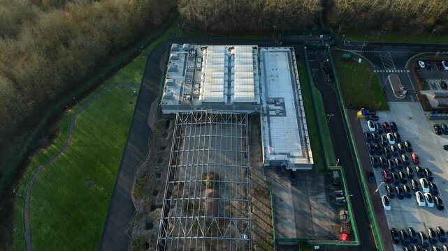Birmingham, United Kingdom - 31 December 2025: Aerial view of the sprawling ATOS long bridge data centre, contrasting with the surrounding greenery.