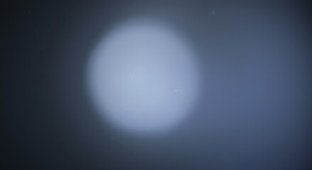 Abstract texture background featuring soft light diffusing through a frosted, blurry translucent layer suitable for modern designs, hazy, gray, light