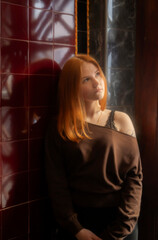 portrait of young woman with red hair