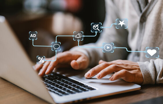 An analyst uses a computer and dashboard for data business analysis and Data Management System with KPI and metrics connected to the database for technology finance, operations, sales, marketing. - Powered by Adobe