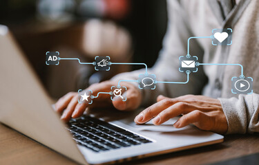 An analyst uses a computer and dashboard for data business analysis and Data Management System with KPI and metrics connected to the database for technology finance, operations, sales, marketing.