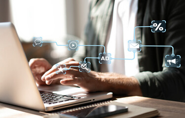 An analyst uses a computer and dashboard for data business analysis and Data Management System with KPI and metrics connected to the database for technology finance, operations, sales, marketing.