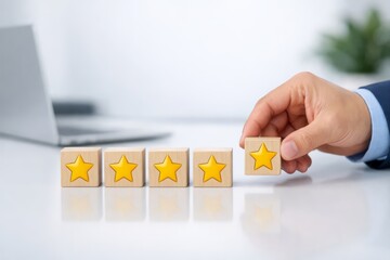 Hand placing a star rating block to complete a five-star customer review row on a desk, symbolizing feedback, satisfaction, and service quality
