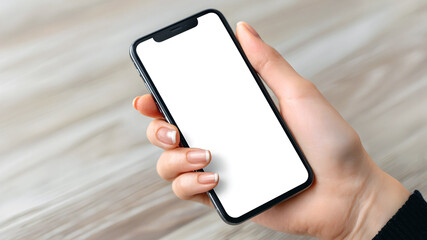 Hand holding smartphone with blank white screen, ideal for mockup, app presentation, mobile interface design, and digital advertising concepts.