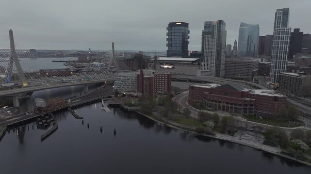 Boston, United States - 24 December 2025: Aerial view of the iconic Zakim bridge and modern buildings under a diffused light, creating a stunning cityscape.