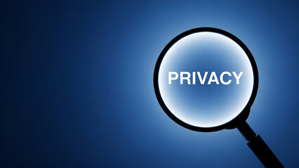 Illuminated magnifying glass focuses on the word privacy highlighting data security concepts against a dark blue background