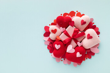 Valentine day gift box decorated with pink and red love hearts top view. Beautiful festive...