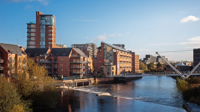Winter sun on Leeds Skyline from Leeds Dock on the River Aire, Leeds, West Yorkshire, England November 2025.