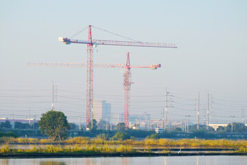 A crane is used for constructing buildings.