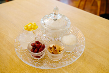 A decorated ice cream set served in a glass bowl ,Ice cream concept.