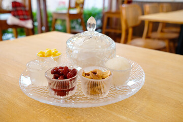 A decorated ice cream set served in a glass bowl ,Ice cream concept.
