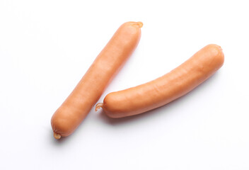 Miniature meat sausages on white background