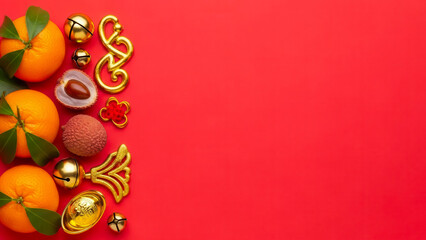 Fototapeta premium Chinese new year celebration with fruits and gold ornaments