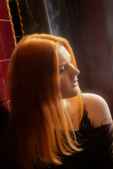 portrait of young woman with red hair