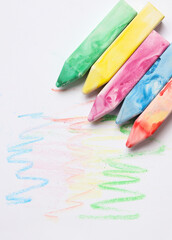 Set of colored chalks for children's creativity on a white background