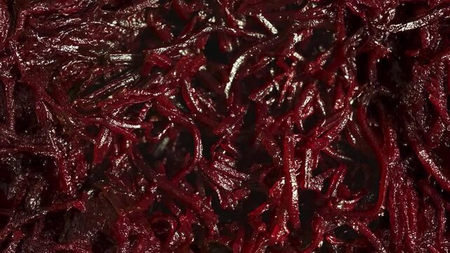 grated beetroot texture. food background. 