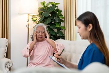 Caring Conversation: A compassionate caregiver attentively listens to an elderly individual. The scene is illuminated by natural light, fostering a sense of warmth and trust.