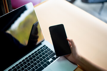 Using laptops and smartphones, shopping online, online transactions, copyspace, online banners.