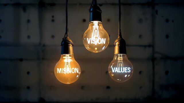 Lights showing mission vision and values in a modern space