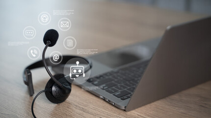 Customer support headset on desk with laptop and online chat interface, help desk communication and AI chatbot service concept for business technology in modern office, copy space.