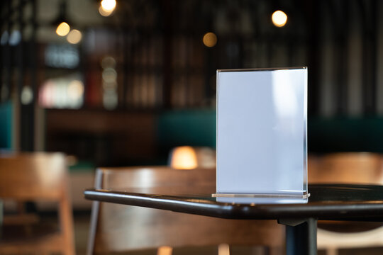 Stand Mock up Table tent menu card on blurred cafe bar background design key visual layout