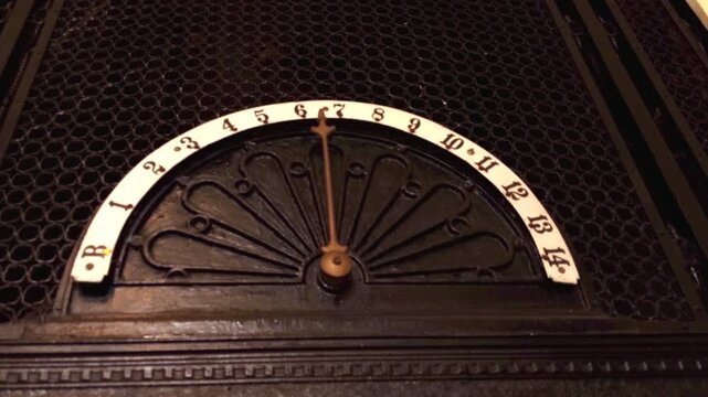 Antique Elevator Dial Showing Floor Numbers, Close Up