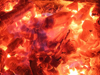 Closeup of burning and glowing embers of wood burning fire