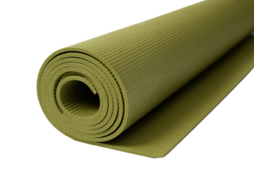 Rolled up green yoga mat close-up