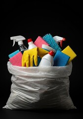 Household cleaning supplies being crammed into a disposal sack, symbolizing the end of boring daily chores and tasks and newfound relief ,maintenance ,escape ,messy