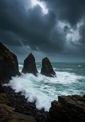 Huge jagged rock formations fiercely battered by giant ocean waves under dark, ominous storm clouds during powerful turbulent weather ,impact ,high ,raw