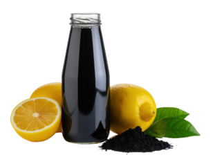 A glass bottle filled with a dark liquid, accompanied by fresh lemons and black powder, highlighting a contrast of colors and textures.
