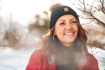 Portrait of mature woman in winter park