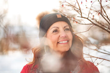 Portrait of mature woman in winter park